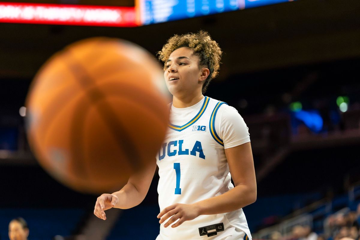 UCLA guard, Kiki Rice (1) pauses after a foul during a NCAA basketball game against Cal Poly on December 16, 2025 in Los Angeles, CA.