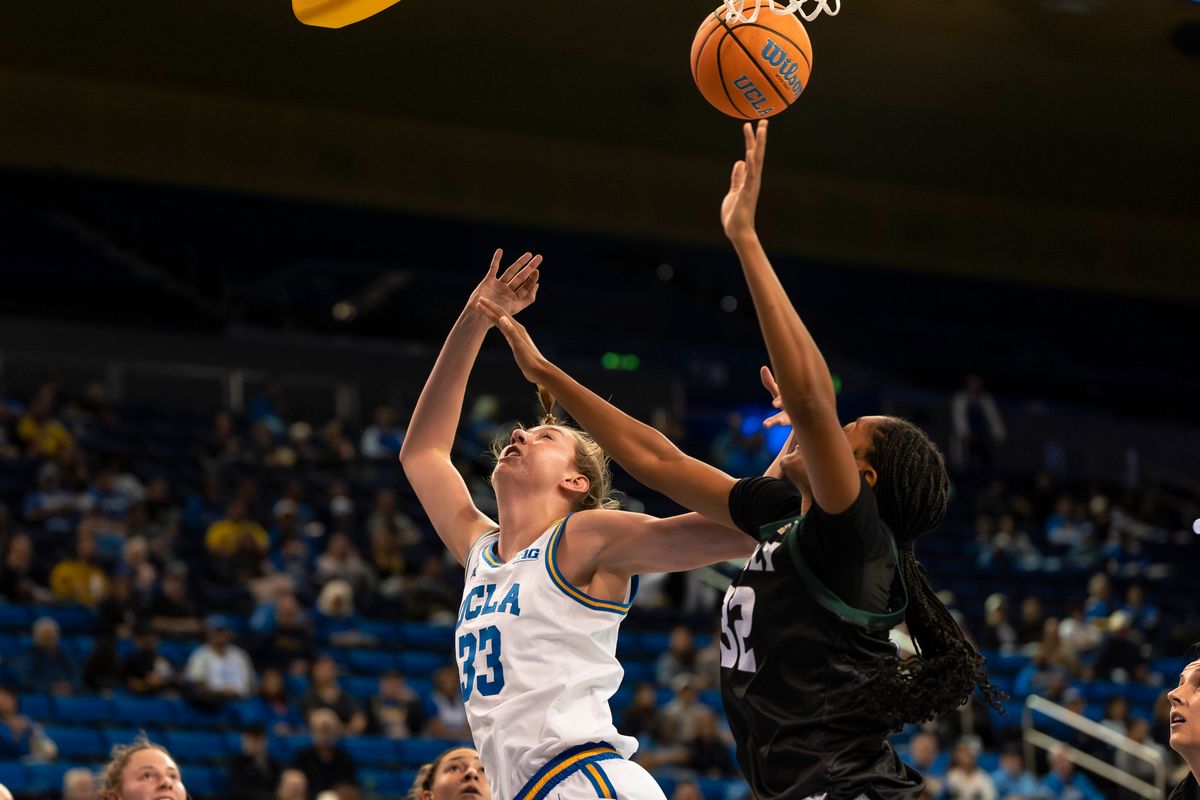 UCLA forward, Amanda Muse (33) playing defense during a NCAA basketball game against Cal Poly on December 16, 2025 in Los Angeles, CA.