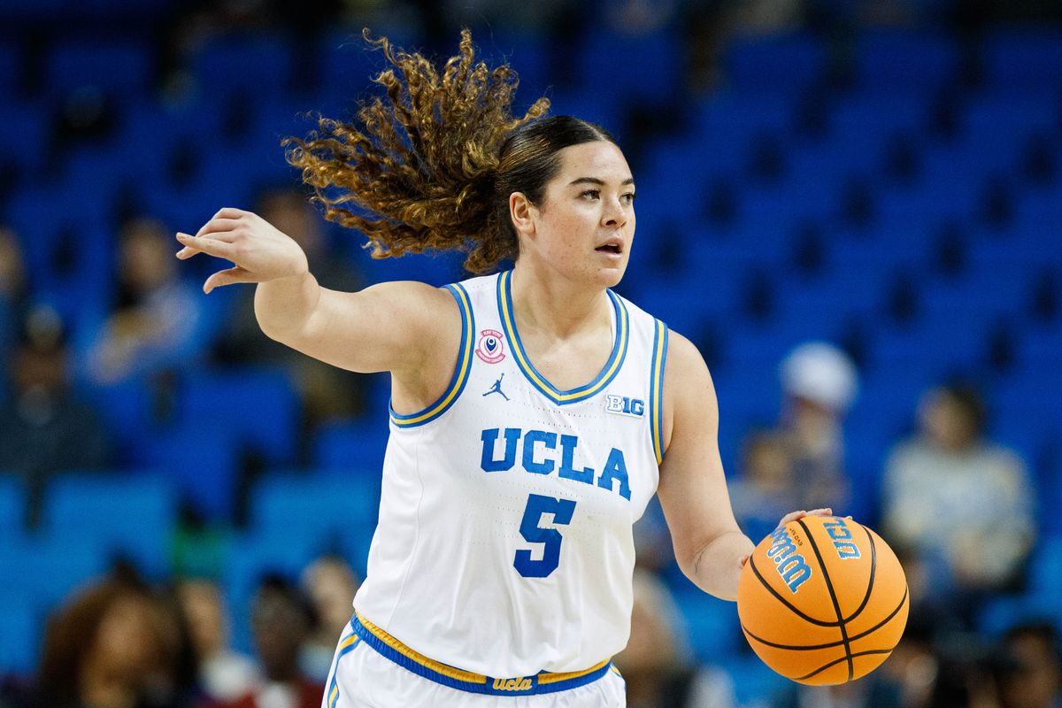 UCLA Bruins guard Charlisse Leger-Walker (5) signals during an NCAA basketball game against Long Beach State, Saturday December 20, 2025 in Los Angeles, Calif.