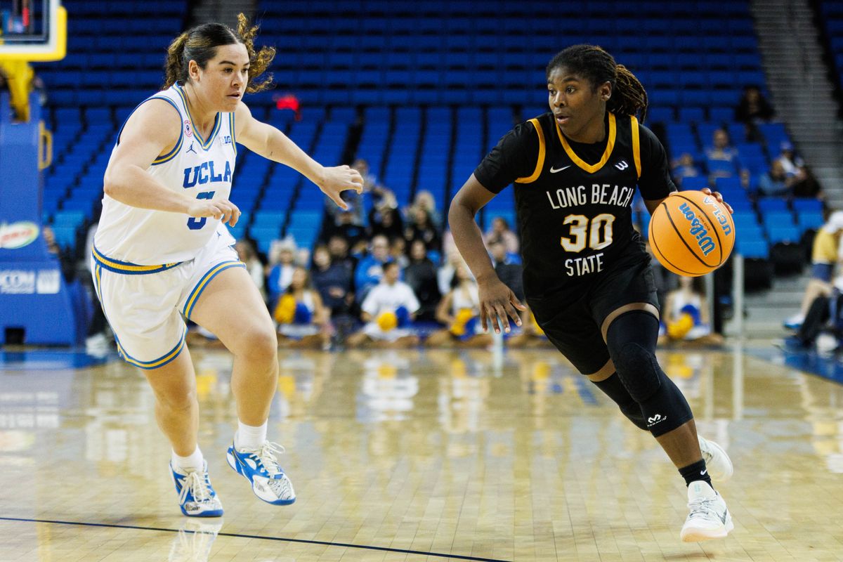 Long Beach State guard JaQuoia Jones-Brown (30) dribbles the ball during an NCAA basketball game against the UCLA Bruins, Saturday December 20, 2025 in Los Angeles, Calif.