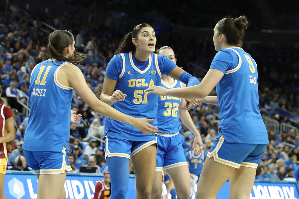 UCLA center Lauren Betts (51) huddles up with teammates during an NCAA basketball game against USC on January 3, 2026 in Los Angeles, CA.
