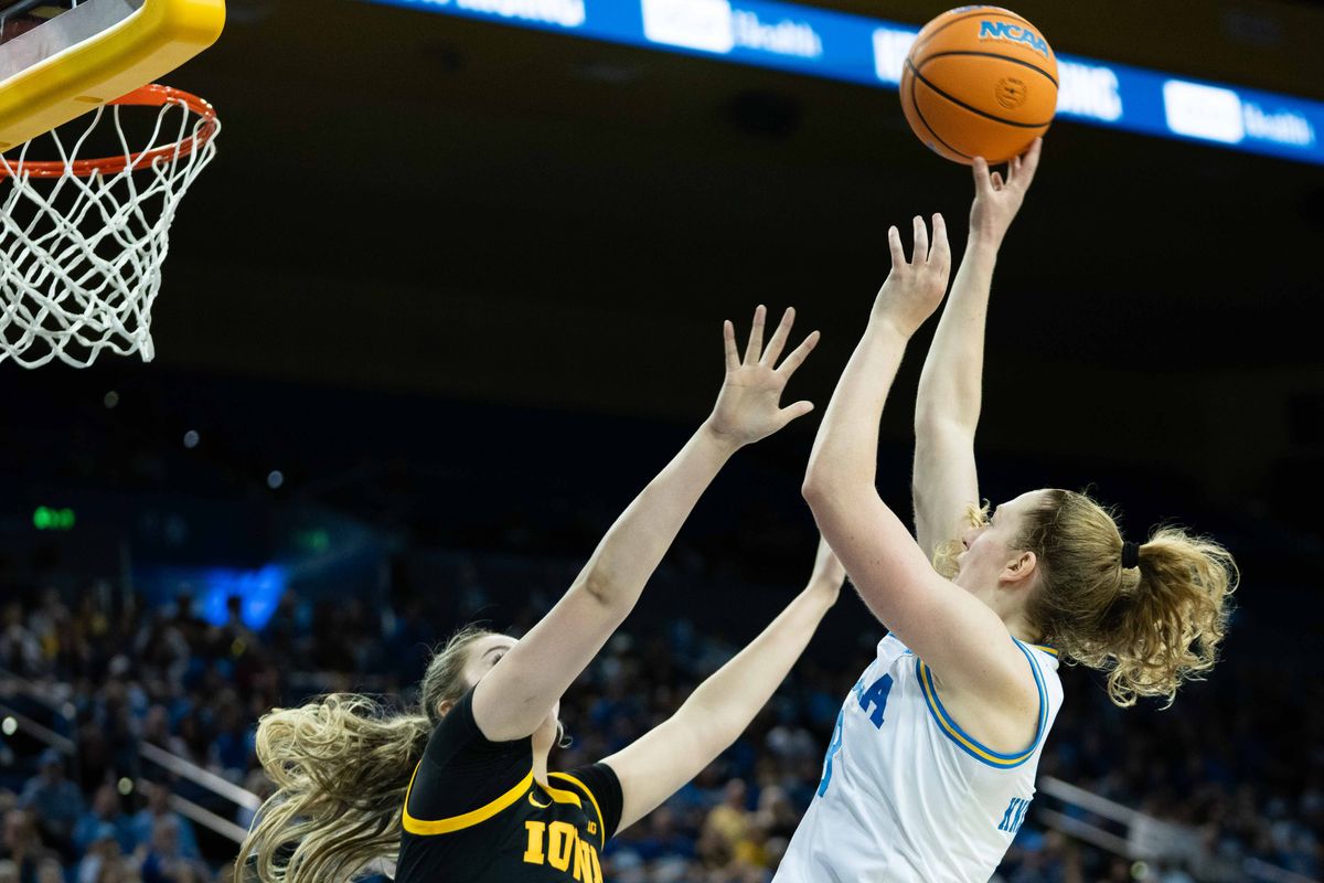 UCLA guard Gianna Kneepkens (8) shoots the ball during a Big 10 basketball game against Iowa, Sunday February 1st, 2026 in Los Angeles, California
