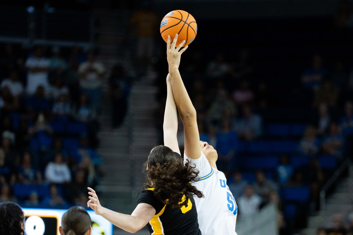 UCLA center Lauren Betts (51) jumps for tip-off during a Big 10 basketball game against Iowa, Sunday February 1st, 2026 in Los Angeles, California