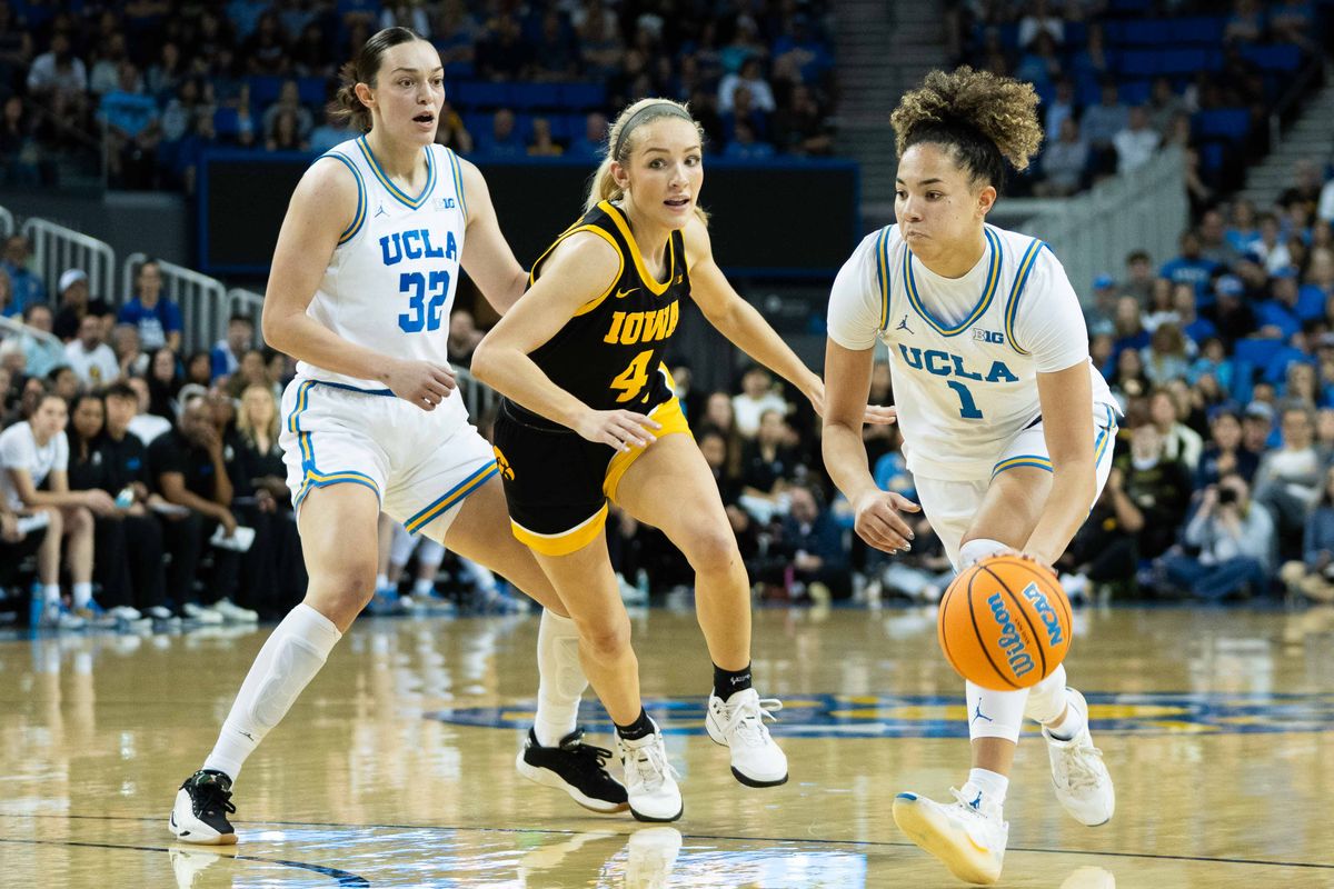 UCLA guard Kiki Rice (1) looking for the open teammate during a Big 10 basketball game against Iowa, Sunday February 1st, 2026 in Los Angeles, California