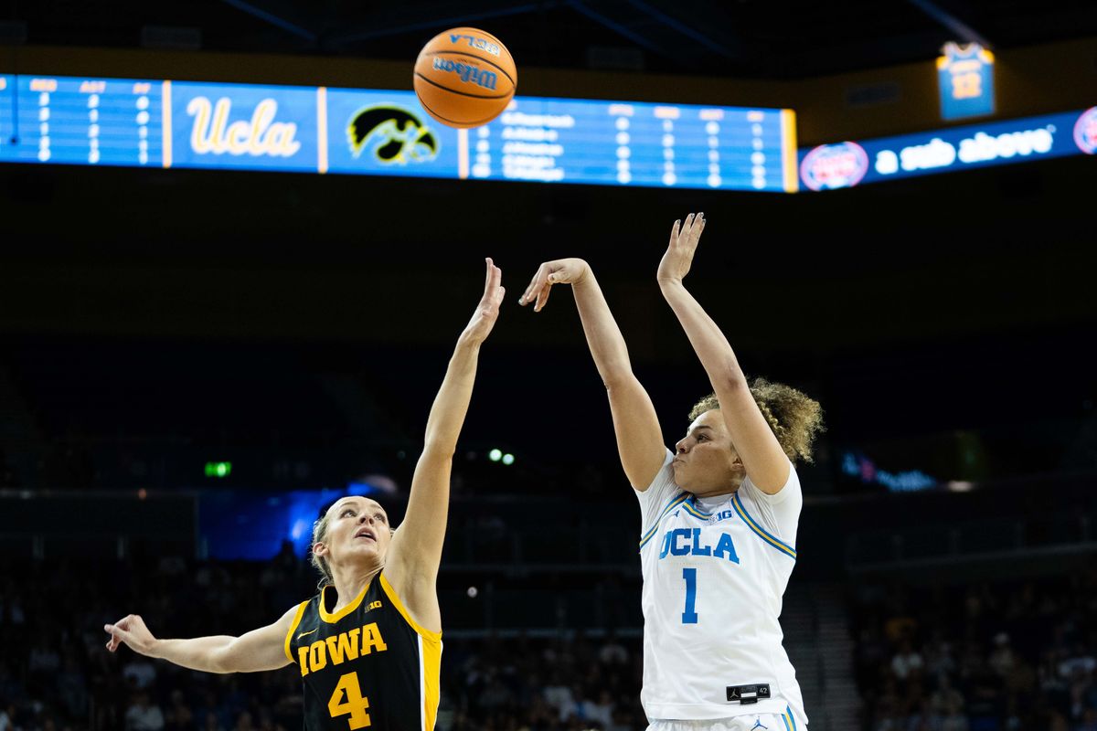 UCLA guard Kiki Rice (1) shoots the ball during a Big 10 basketball game against Iowa, Sunday February 1st, 2026 in Los Angeles, California