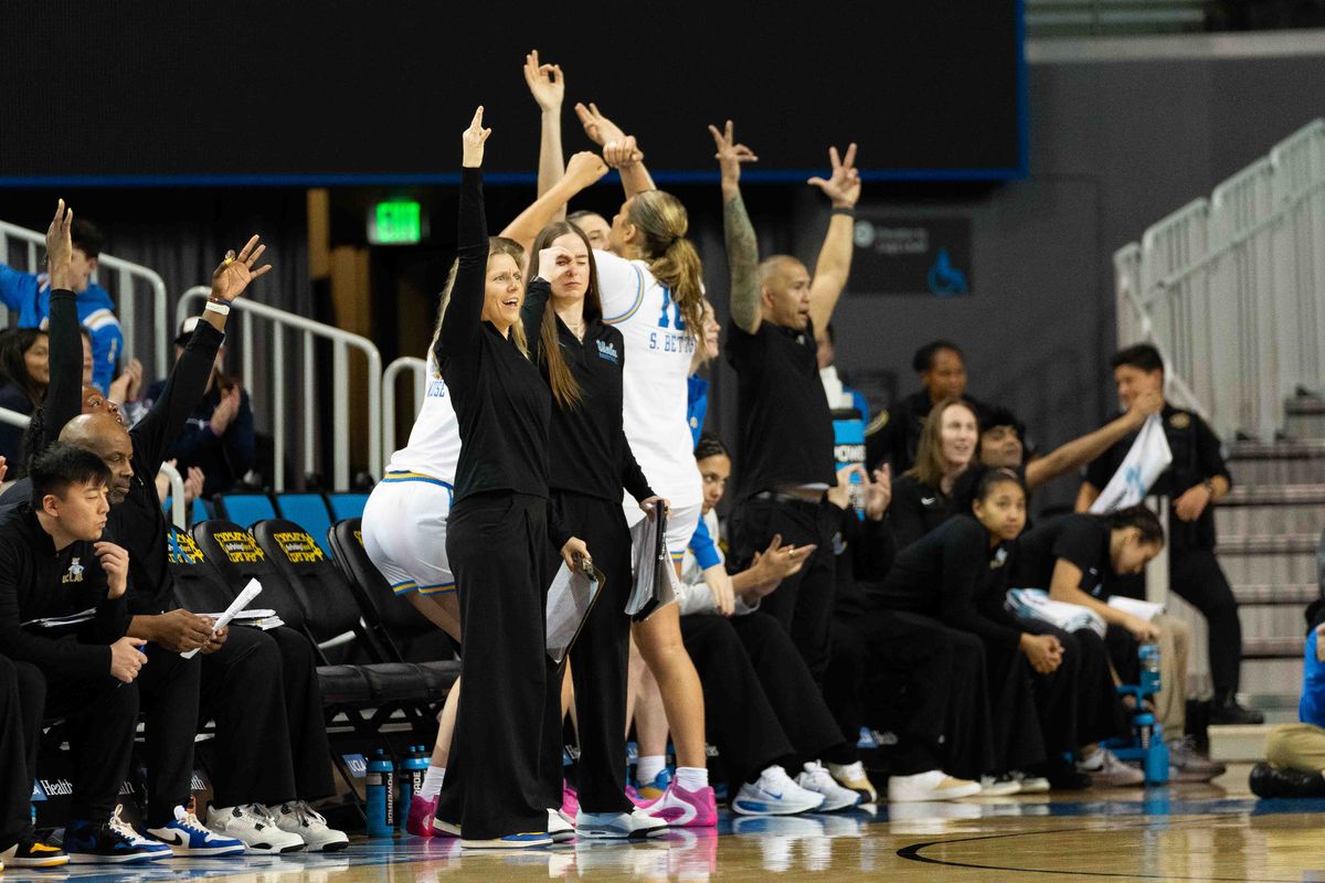 UCLA bench celebrates a three-pointer during a Big 10 basketball game against Washington, Thursday February 19th, 2026 in Los Angeles, California