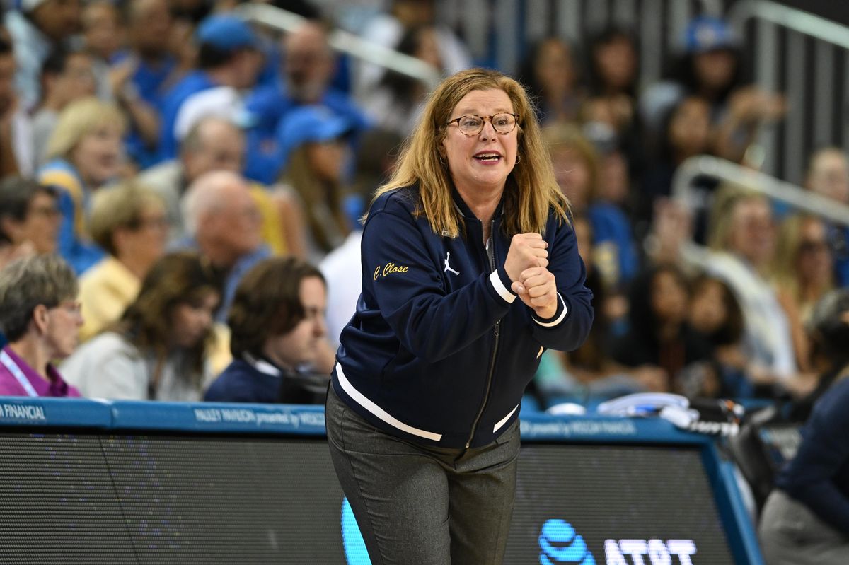 UCLA head coach Cori Close communicates with her players during an NCAA Women's Basketball game between Oklahoma State University and University of California Los Angeles on Monday, March 23, 2026 at Pauley Pavilion in Los Angeles Calif