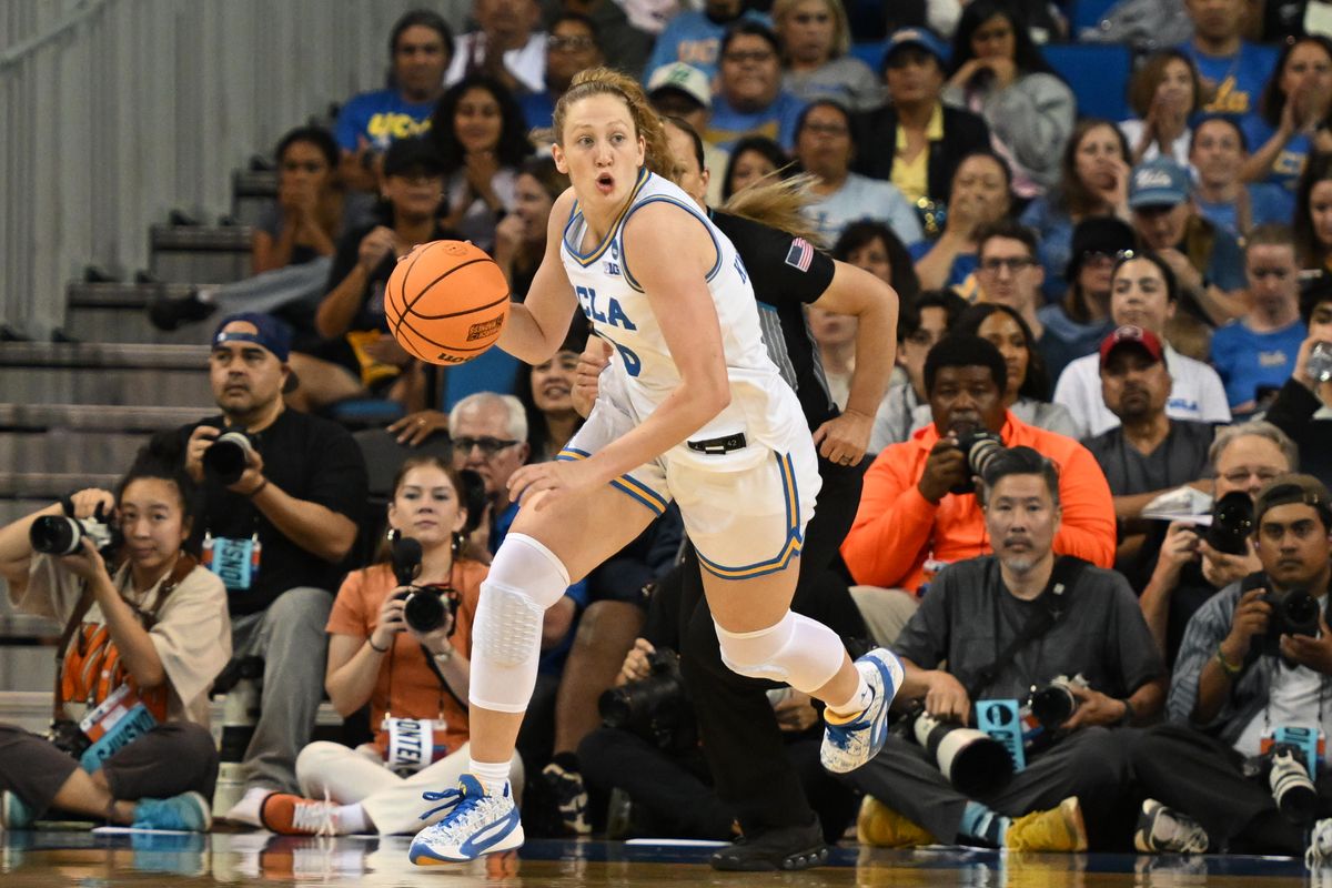 UCLA guard Gianna Kneepkens #8 runs the ball downcourt during a fast break during an NCAA Women's Basketball game between Oklahoma State University and University of California Los Angeles on Monday, March 23, 2026 at Pauley Pavilion in Los Angeles Calif
