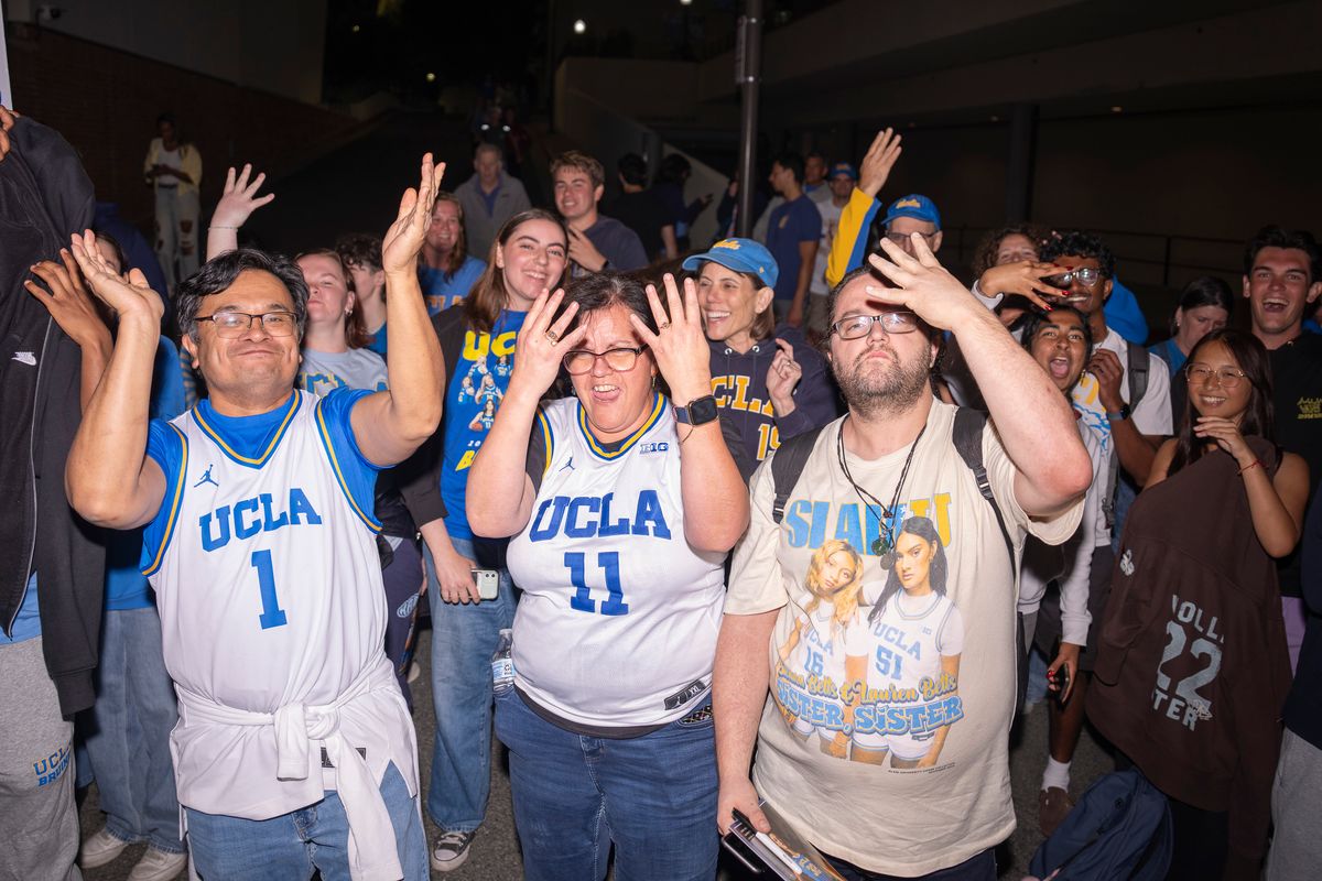 UCLA fans cheer for the UCLA women's basketball team as the team arrives back on campus after winning the NCAA women's basketball National Championship on April 5th, 2026 at UCLA Campus in Los Angeles, CA. UCLA fans cheer for the UCLA women's basketball team as the team arrives back on campus after winning the NCAA women's basketball National Championship on April 5th, 2026 at UCLA Campus in Los Angeles, CA.