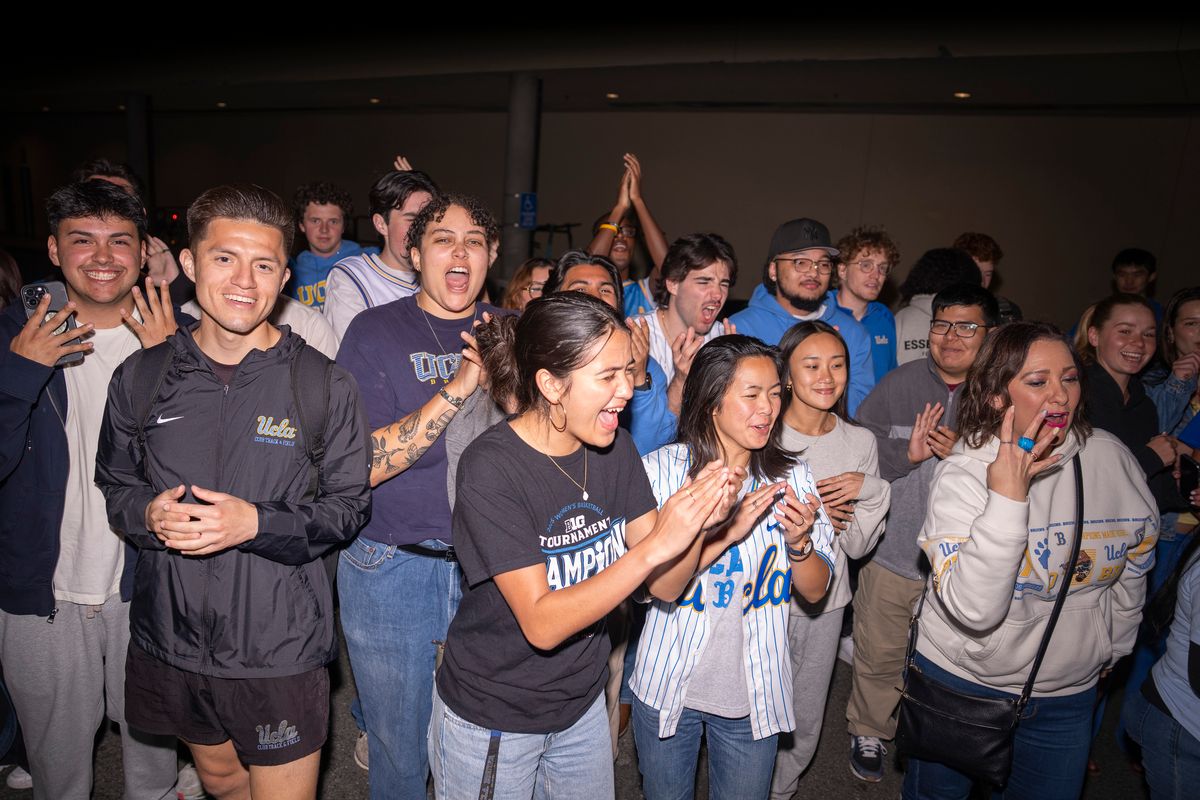 UCLA fans cheer for the UCLA women's basketball team as the team arrives back on campus after winning the NCAA women's basketball National Championship on April 5th, 2026 at UCLA Campus in Los Angeles, CA. UCLA fans cheer for the UCLA women's basketball team as the team arrives back on campus after winning the NCAA women's basketball National Championship on April 5th, 2026 at UCLA Campus in Los Angeles, CA.