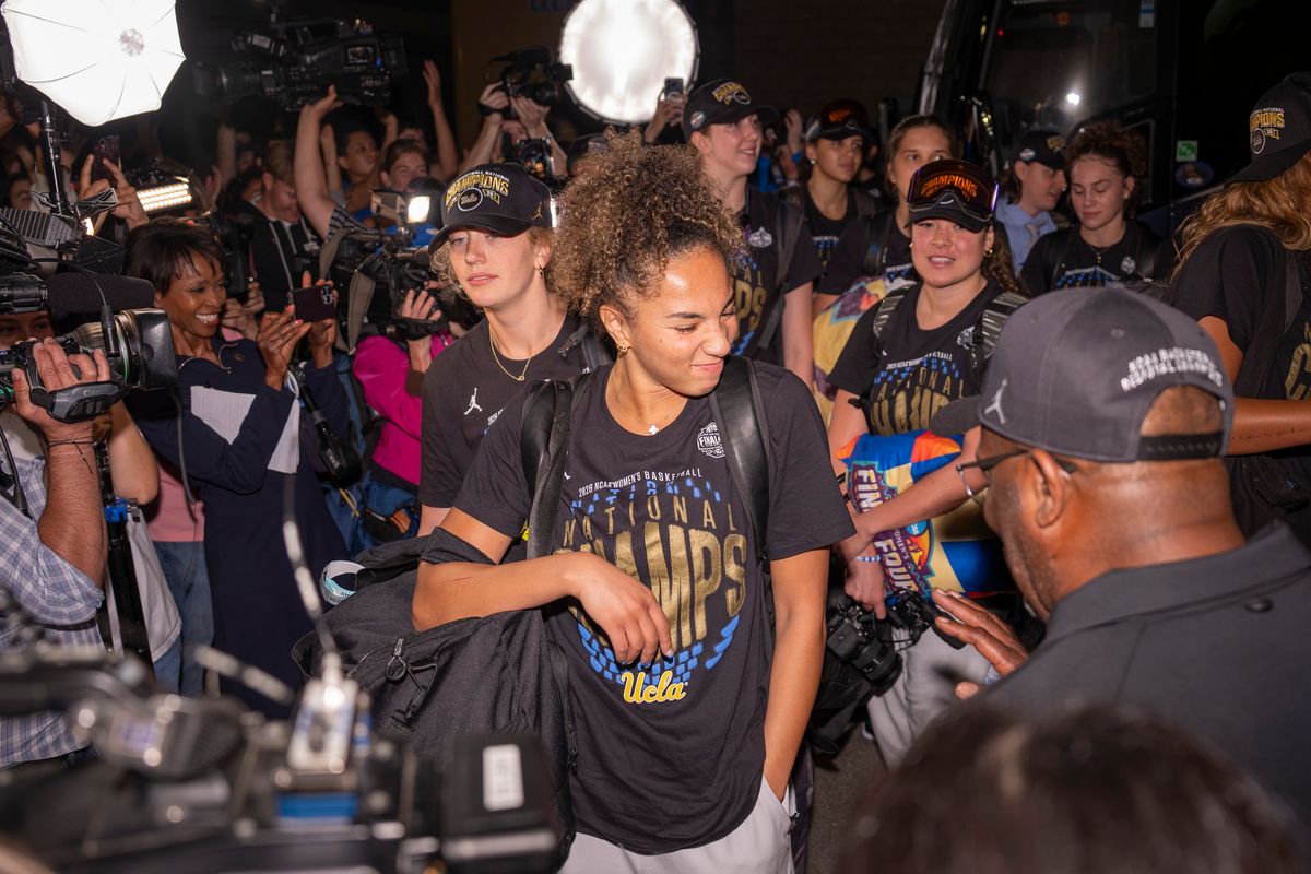 UCLA guard Kiki Rice (1) celebrates with fans after winning the NCAA women's basketball National Championship on April 5th, 2026 at UCLA Campus in Los Angeles, CA. UCLA guard Kiki Rice (1) celebrates with fans after winning the NCAA women's basketball National Championship on April 5th, 2026 at UCLA Campus in Los Angeles, CA.