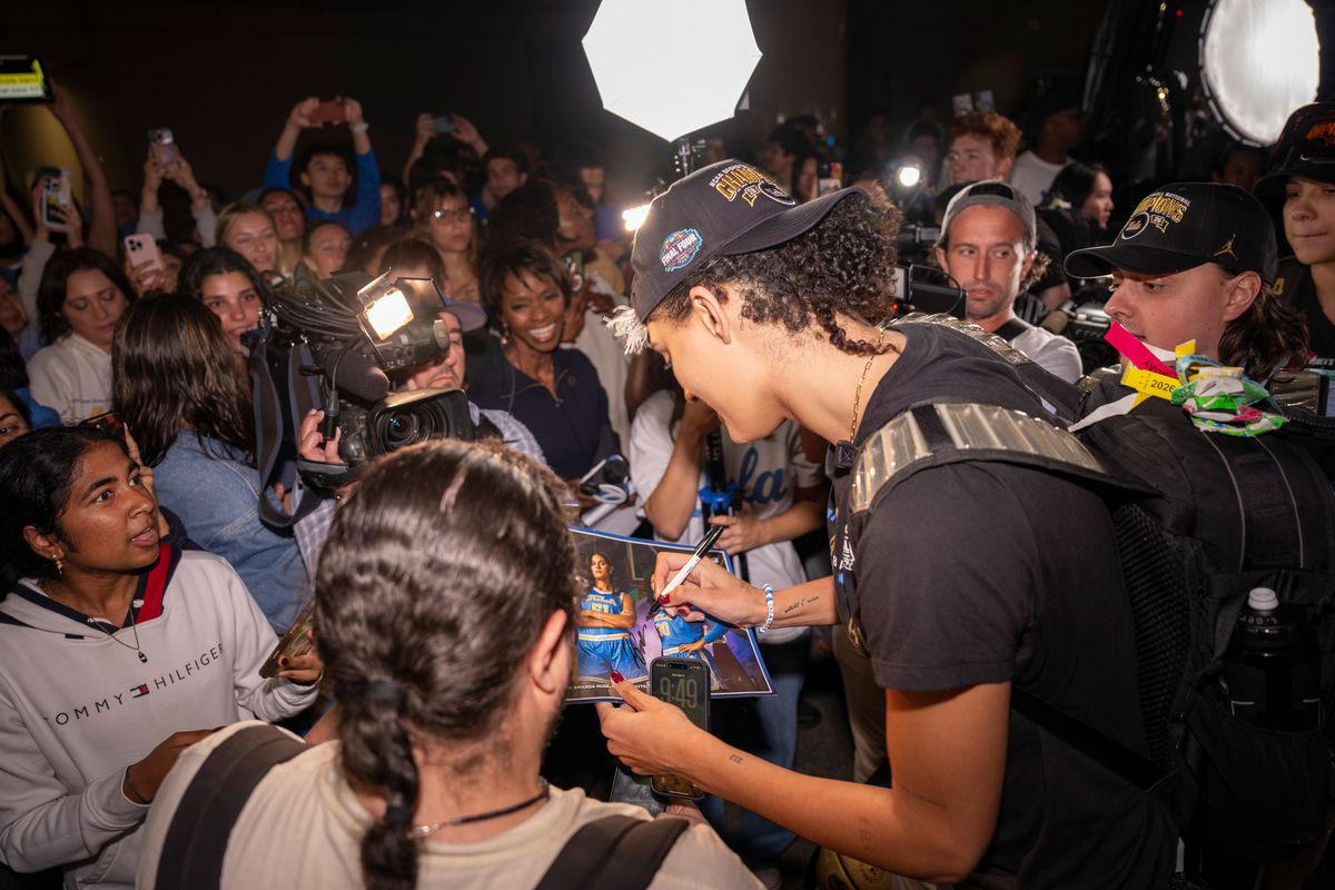 UCLA center Lauren Betts (51) signs autographs for fans after winning the NCAA women's basketball National Championship on April 5th, 2026 at UCLA Campus in Los Angeles, CA. UCLA center Lauren Betts (51) signs autographs for fans after winning the NCAA women's basketball National Championship on April 5th, 2026 at UCLA Campus in Los Angeles, CA.