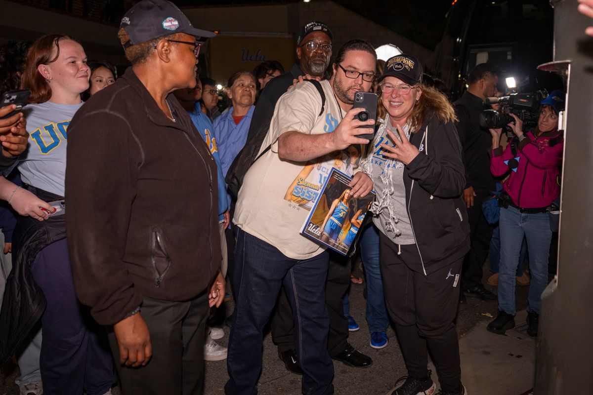 UCLA head coach Cori Close takes photos with fans after winning the NCAA women's basketball National Championship on April 5th, 2026 at UCLA Campus in Los Angeles, CA. UCLA head coach Cori Close takes photos with fans after winning the NCAA women's basketball National Championship on April 5th, 2026 at UCLA Campus in Los Angeles, CA.