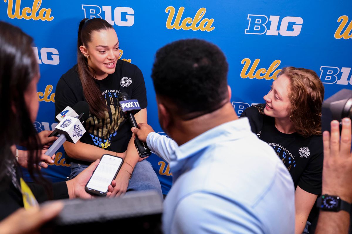 Angela Dugalić and Gianna Kneepkens are interviewed during the celebration for the NCAA Champion UCLA Bruins Women’s basketball team, Wednesday April 8, 2026, in Los Angeles, Calif.