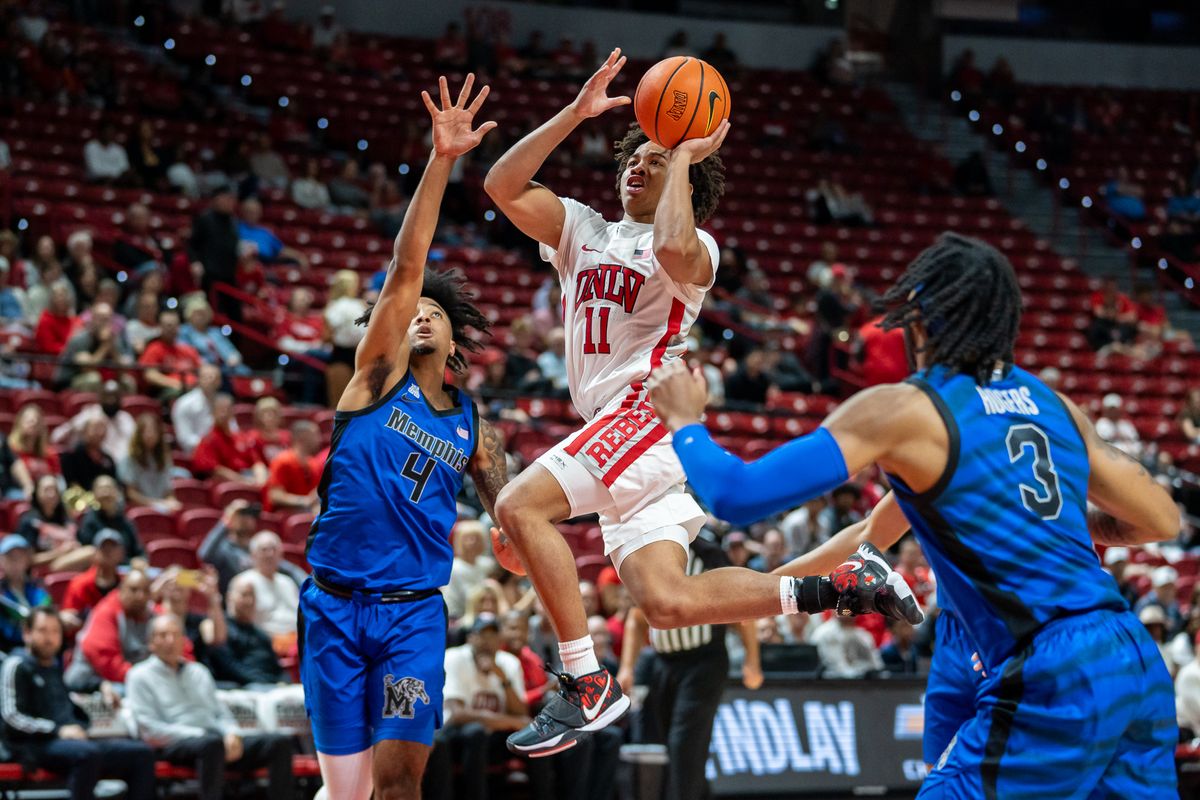 UNLV guard Dedan Thomas Jr. launches towards the basket during college basketball game against Memphis on Saturday November 9, 2024 in Las Vegas.