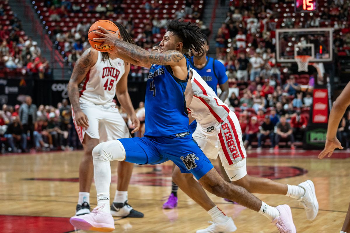 Memphis guard PJ Haggerty (4) drives into the paint during college basketball game against UNLV on Saturday November 9, 2024 in Las Vegas.