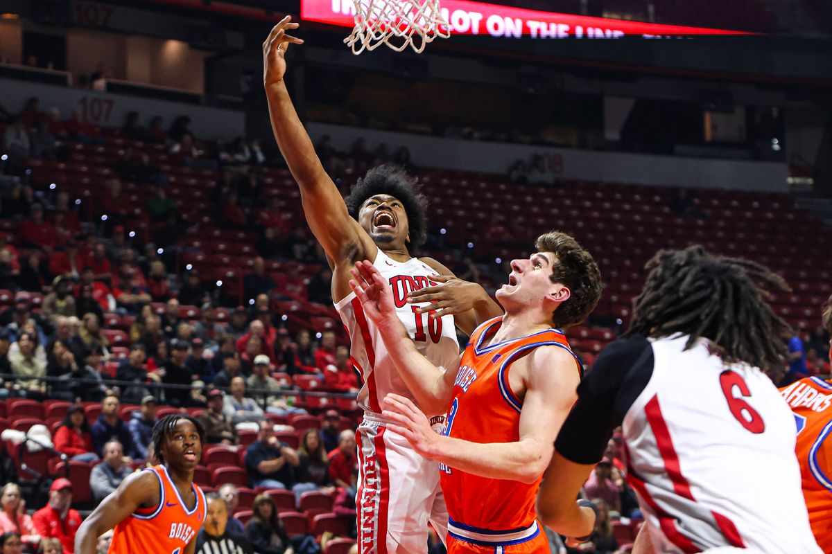 UNLV Runnin' Rebels F Jacob Bannarbie (10) lays up over a Boise State Broncos defender during a college basketball game on Tuesday January 13, 2026, in Las Vegas, Nevada. 