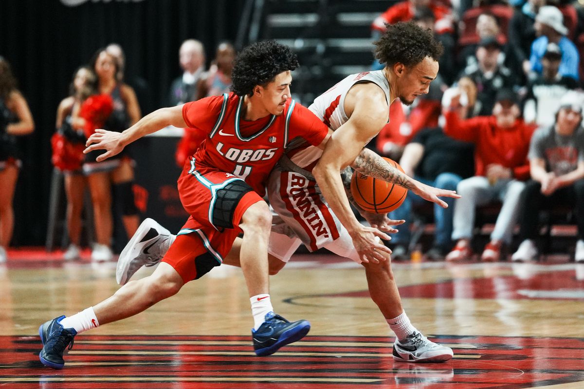 UNLV guard Dray Gibbs-Lawhorn (0) attempts to take the ball down the court and escape New Mexico Uriah Tenette (4) during first half of college basketball game against New Mexico on Tuesday, January 27, 2026 at Thomas & Mack Arena in Las Vegas.