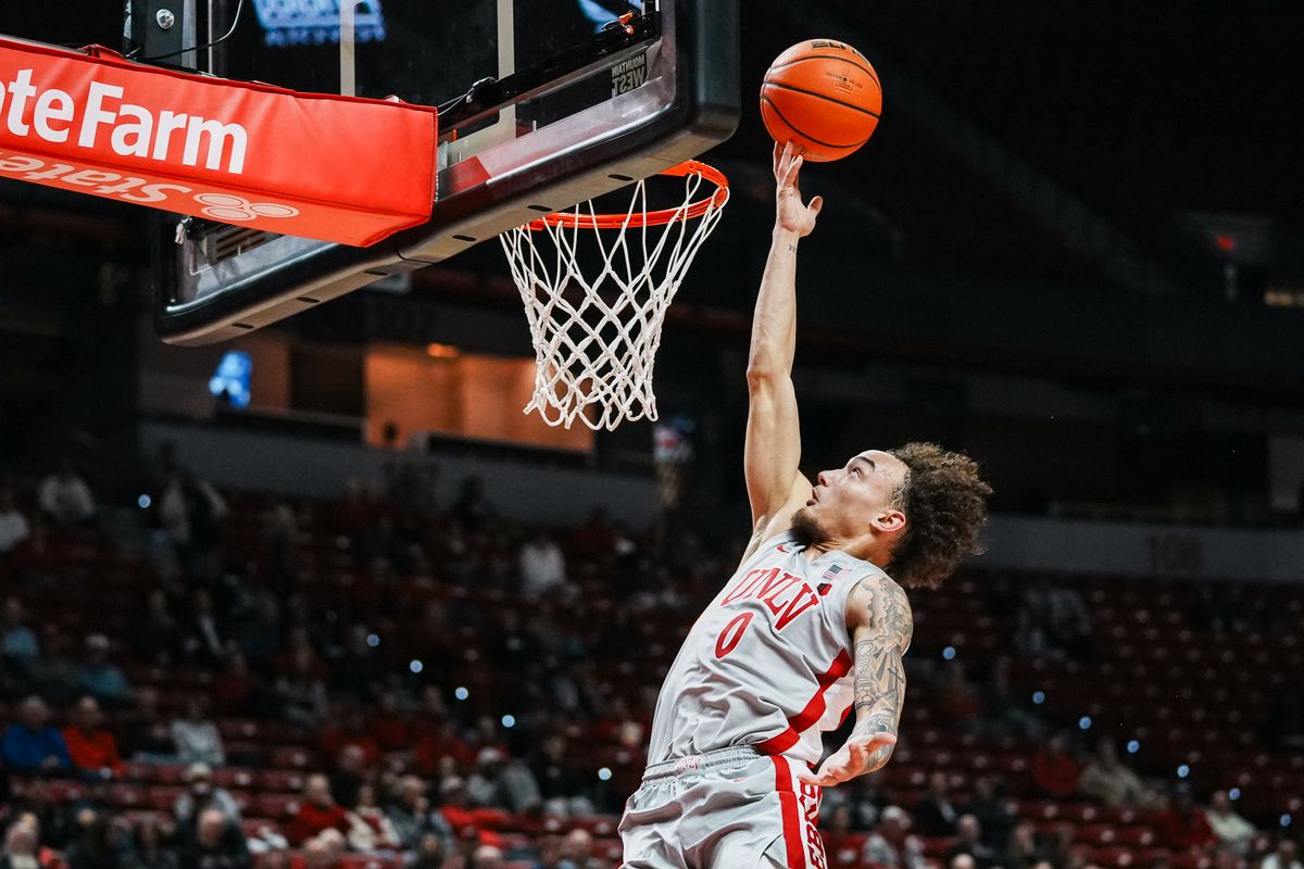 UNLV guard Dray Gibbs-Lawhorn (0) attempts a layup during first half of college basketball game against New Mexico on Tuesday, January 27, 2026 at Thomas & Mack Arena in Las Vegas.