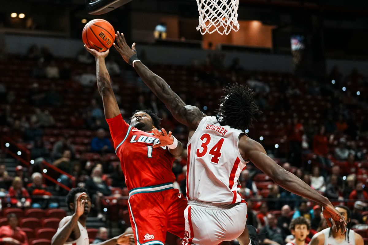 New Mexico guard Deyton Albury (1) shoots the ball while UNLV center Emmanuel Stephen (34) attempts to block the shot during second half of college basketball game against UNLV  on Tuesday, January 27, 2026 at Thomas & Mack Arena in Las Vegas.