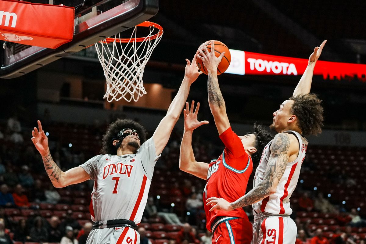 UNLV guard Dray Gibbs-Lawhorn (0) and Al green (7) attempt to block a shot from New Mexico Uriah Tenette (4) during second half of college basketball game against New Mexico on Tuesday, January 27, 2026 at Thomas & Mack Arena in Las Vegas.UNLV guard Dray Gibbs-Lawhorn (0) and Al green (7) attempt to block a shot from New Mexico Uriah Tenette (4) during second half of college basketball game against New Mexico on Tuesday, January 27, 2026 at Thomas & Mack Arena in Las Vegas.