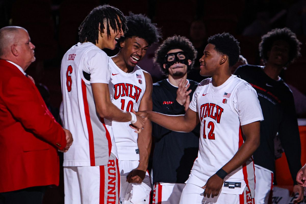 UNLV Runnin' Rebels G Issac Williamson (12) seen with his teammates F Tyrin Jones (6) and F Jacob Bannarbie (10) during pregame introductions against the San Jose State Spartans on Tuesday February 10, 2026, in Las Vegas, Nevada. 