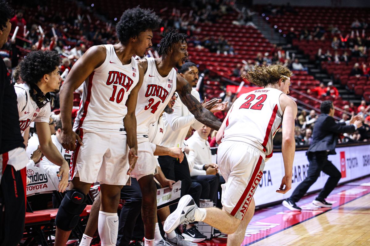  UNLV Runnin' Rebels F Jacob Bannarbie (10) and C Emmanuel Stephen (34) react after their teammate F Walter Brown (22) hits a three-point shot against the San Jose State Spartans on Tuesday February 10, 2026, in Las Vegas, Nevada. 