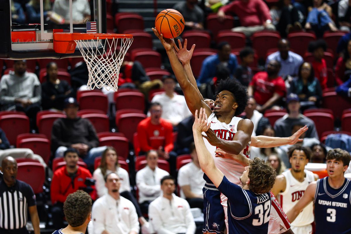 UNLV Runnin' Rebels F Jacob Bannarbie (10) draws a foul while shooting a lay-up shot during a college basketball game against the Utah State Aggies on Tuesday March 3, 2026, in Las Vegas, Nevada. 