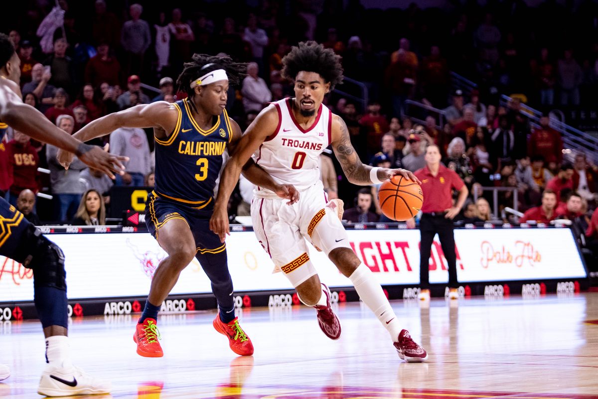 USC Trojans forward Saint Thomas (0) runs the ball hoping to secure a layup during the 1st half of the game against the California Golden Bears on Sunday, November 17th, 2024, at Galen Center in Los Angeles, CA.