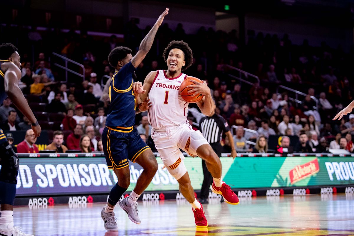 USC Trojans guard Desmond Claude (1) runs the ball while being guarded during the 1st half of the game against the California Golden Bears on Sunday, November 17th, 2024, at Galen Center in Los Angeles, CA.