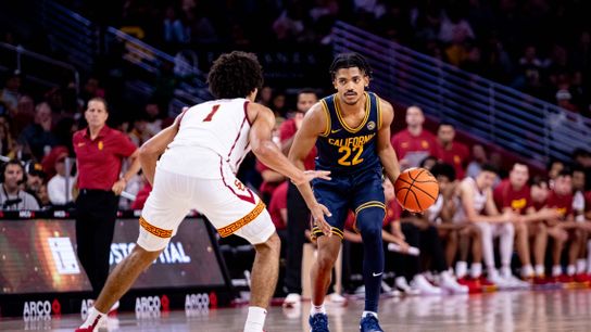 California Golden Bears guard Christian Tucker (22) runs with the ball while being guarded by USC Trojans guard Desmond Claude (1) during the 2nd half of the game against the California Golden Bears on Sunday, November 17th, 2024, at Galen Center in Los Angeles, CA.