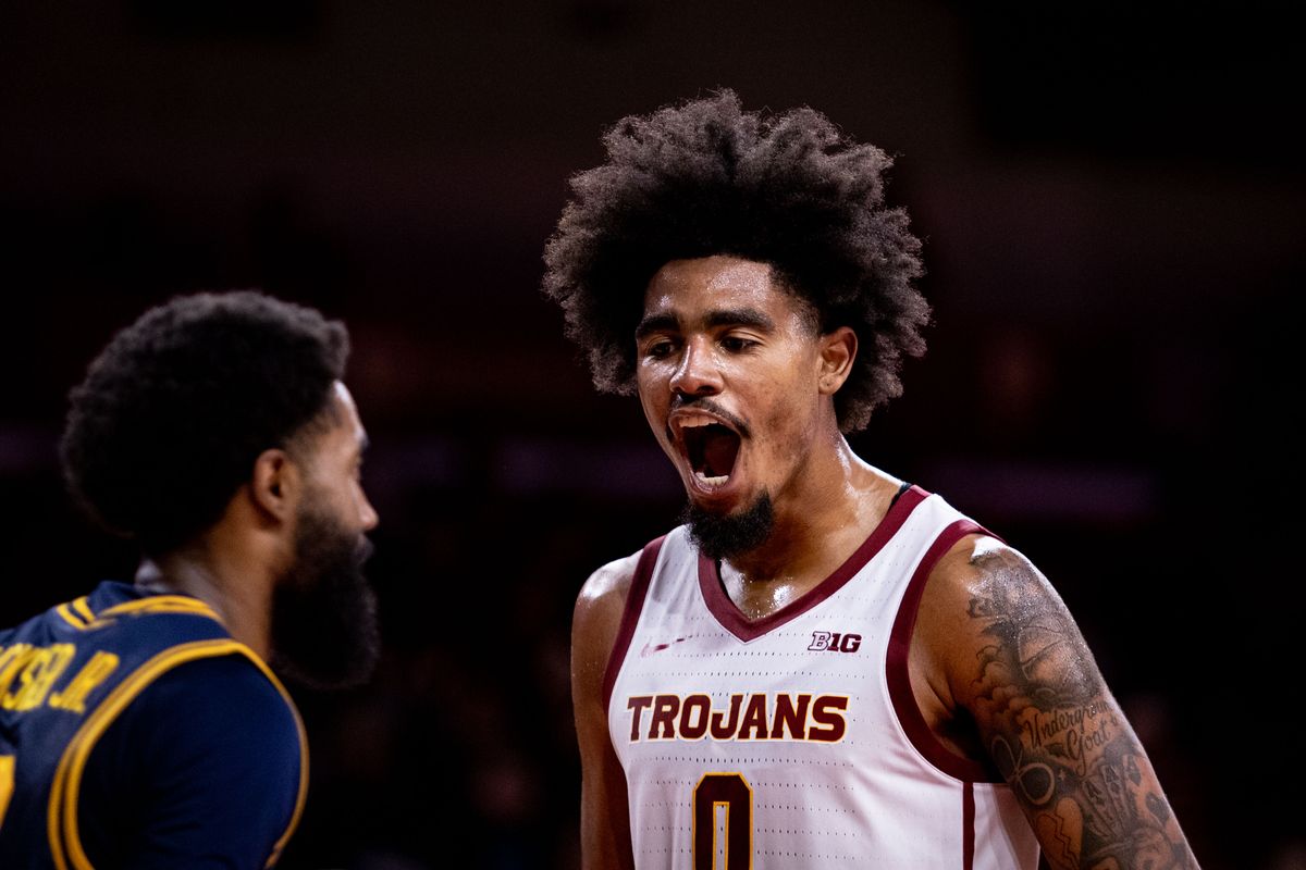 USC Trojans forward Saint Thomas (0) screams at California Golden Bears guard Jovan Blacksher Jr. (10) after scoring during the 2nd half of the game against the California Golden Bears on Sunday, November 17th, 2024, at Galen Center in Los Angeles, CA.