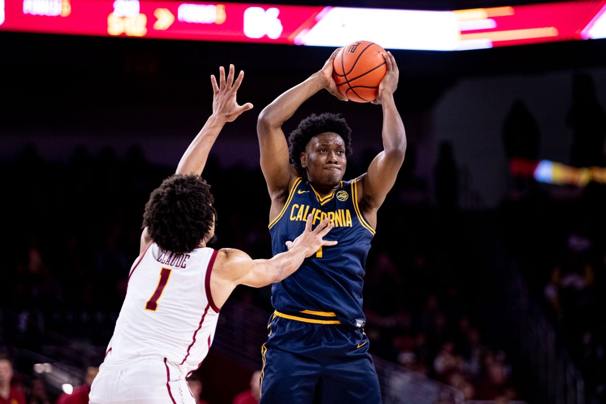 California Golden Bears forward Joshua Ola-Joseph (1) holds ball while being guarded by USC Trojans guard Desmond Claude (1) during the 2nd half of the game against the California Golden Bears on Sunday, November 17th, 2024, at Galen Center in Los Angeles, CA.