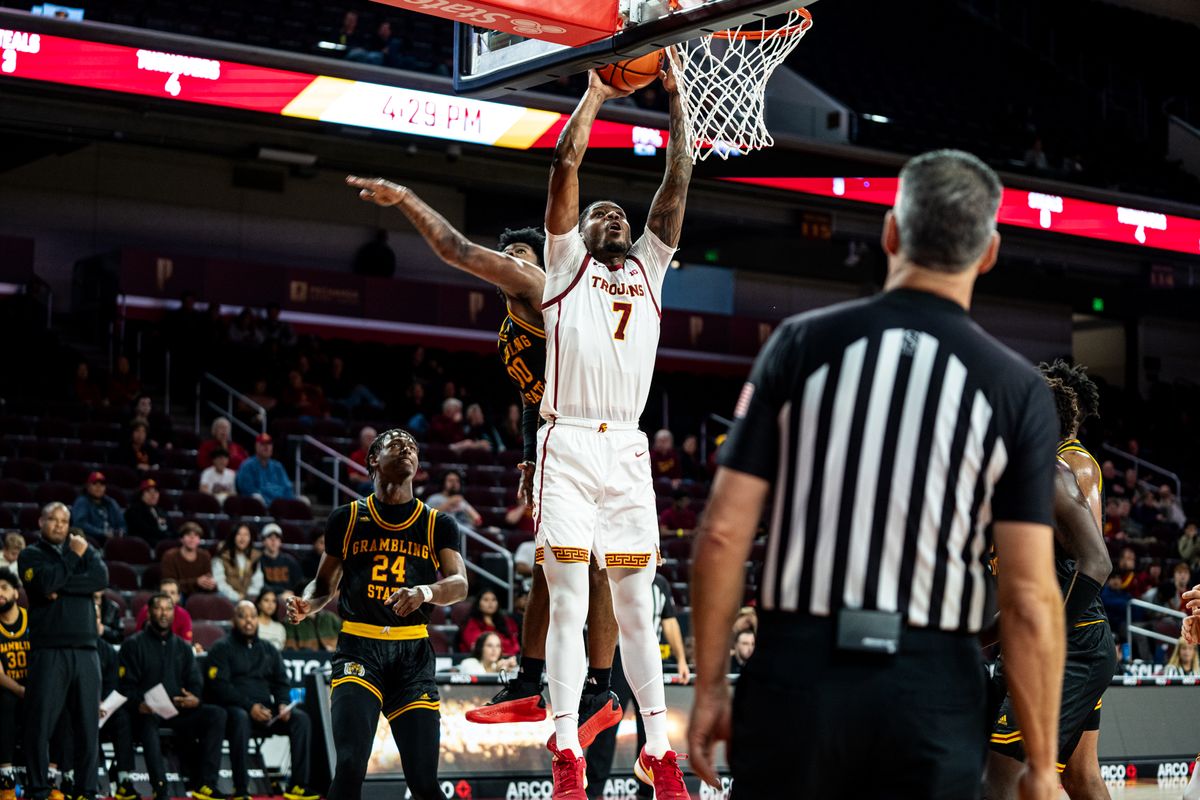 USC Trojans guard Agbo Chibuzo (7) makes a layup during the 1st half of the game against Grambling St on Sunday, November 24th, 2024, at Galen Center in Los Angeles, CA. USC Trojans guard Agbo Chibuzo (7) makes a layup during the 1st half of the game against Grambling St on Sunday, November 24th, 2024, at Galen Center in Los Angeles, CA.