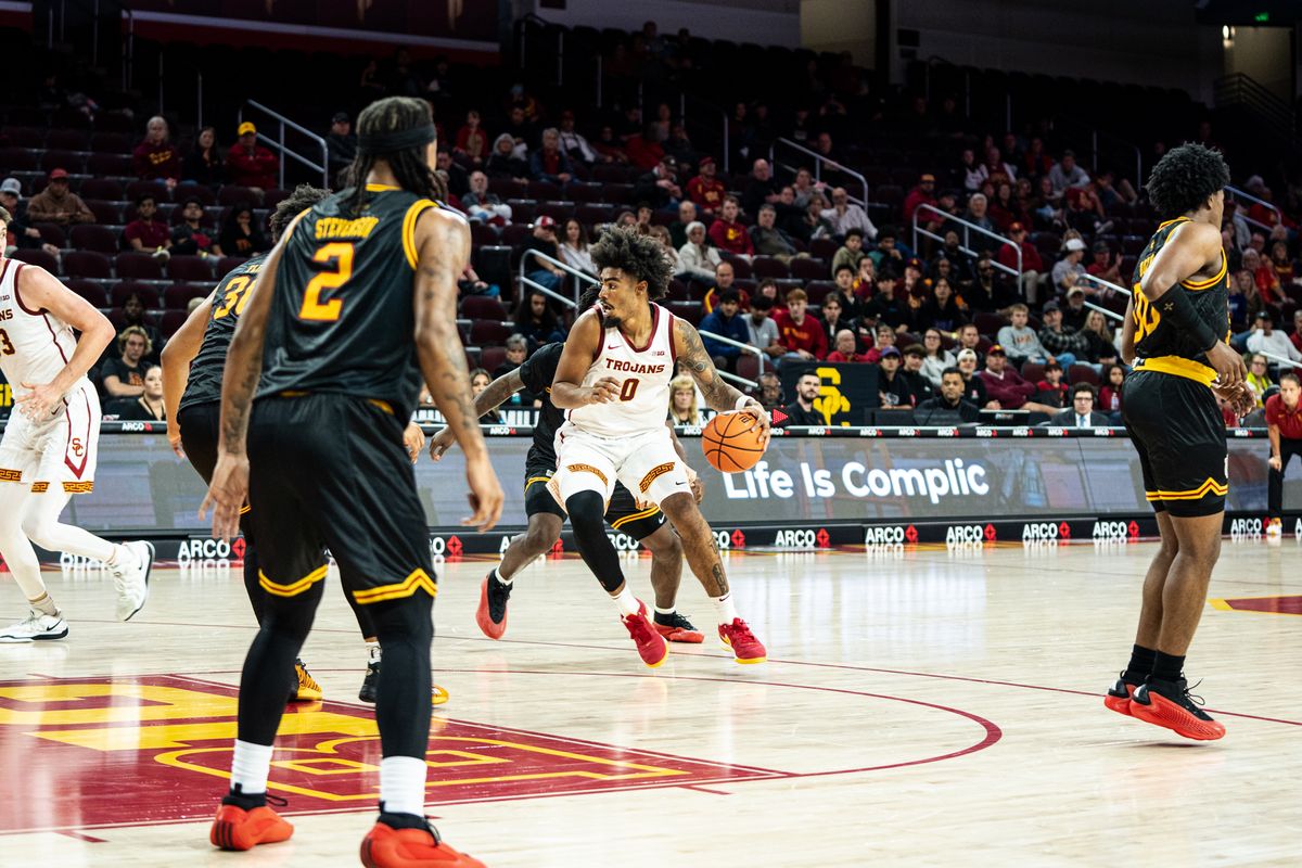 USC Trojans Forward SAINT Thomas (0) attacks the lane in the 1st half of the game against Grambling St on Sunday, November 24th, 2024, at Galen Center in Los Angeles, CA. USC Trojans Forward SAINT Thomas (0) attacks the lane in the 1st half of the game against Grambling St on Sunday, November 24th, 2024, at Galen Center in Los Angeles, CA.