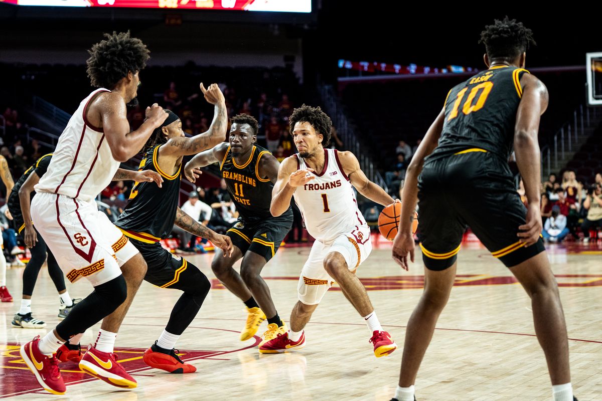 USC Trojans guard Desmond Claude (1) splits the defender in the 2nd half of the game against Grambling St on Sunday, November 24th, 2024, at Galen Center in Los Angeles, CA. USC Trojans guard Desmond Claude (1) splits the defender in the 2nd half of the game against Grambling St on Sunday, November 24th, 2024, at Galen Center in Los Angeles, CA.