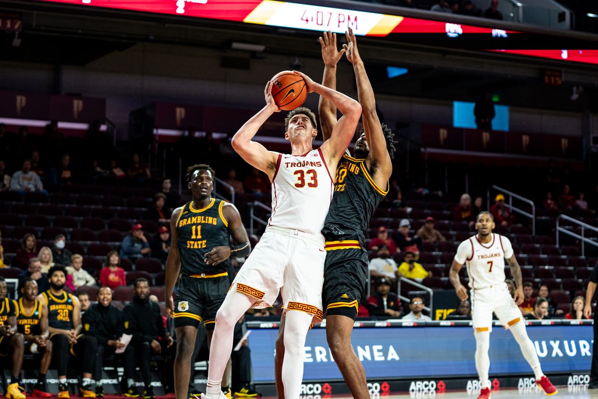 USC Trojans Forward Josh Cohen (33) takes a hard foul on a contested layup during the 2nd half of the game against Grambling St on Sunday, November 24th, 2024, at Galen Center in Los Angeles, CA. USC Trojans Forward Josh Cohen (33) takes a hard foul on a contested layup during the 2nd half of the game against Grambling St on Sunday, November 24th, 2024, at Galen Center in Los Angeles, CA.