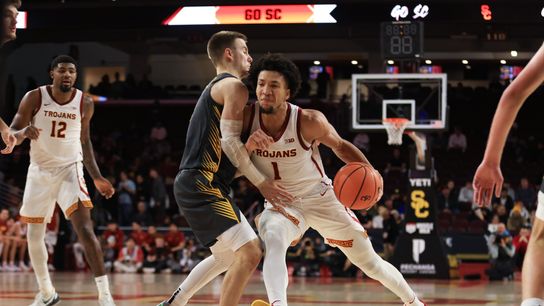 USC G Desmond Claude (1) drives towards the basket against the Iowa Hawkeyes on January 14th, 2025 at the Galen Center in Los Angeles, CA.