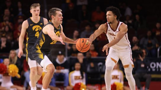 USC G Desmond Claude (1) passes to his teammate against the Iowa Hawkeyes on January 14th, 2025 at the Galen Center in Los Angeles, CA.