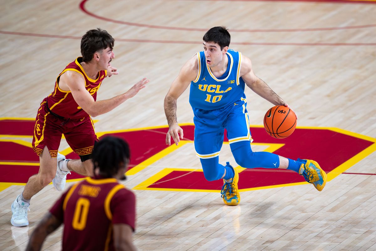 UCLA Bruins guard Lazar Stefanovic (10) runs with the ball during the 1st half of the game against the USC Trojans on Monday, January 27th, 2025, at Galen Center in Los Angeles, CA. UCLA Bruins guard Lazar Stefanovic (10) runs with the ball during the 1st half of the game against the USC Trojans on Monday, January 27th, 2025, at Galen Center in Los Angeles, CA.
