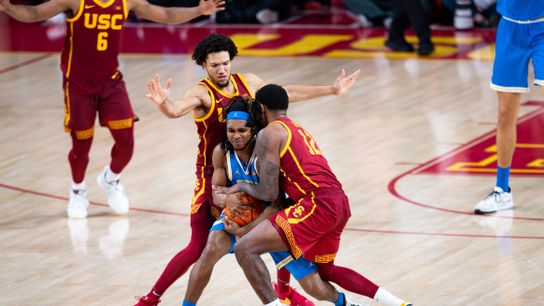 USC Trojans guard Desmond Claude (1) guards UCLA player during the 2nd half of the game against the UCLA Bruins on Monday, January 27th, 2025, at Galen Center in Los Angeles, CA. USC Trojans guard Desmond Claude (1) guards UCLA player during the 2nd half of the game against the UCLA Bruins on Monday, January 27th, 2025, at Galen Center in Los Angeles, CA.