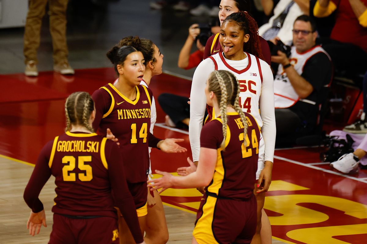 USC Trojans Guard Kiki Iriafen (44) celebrates in front of three frustrated opponents during game against Minnesota Golden Gophers on Thursday, January 30, 2025 in Los Angeles, CA. USC Trojans Guard Kiki Iriafen (44) celebrates in front of three frustrated opponents during game against Minnesota Golden Gophers on Thursday, January 30, 2025 in Los Angeles, CA.