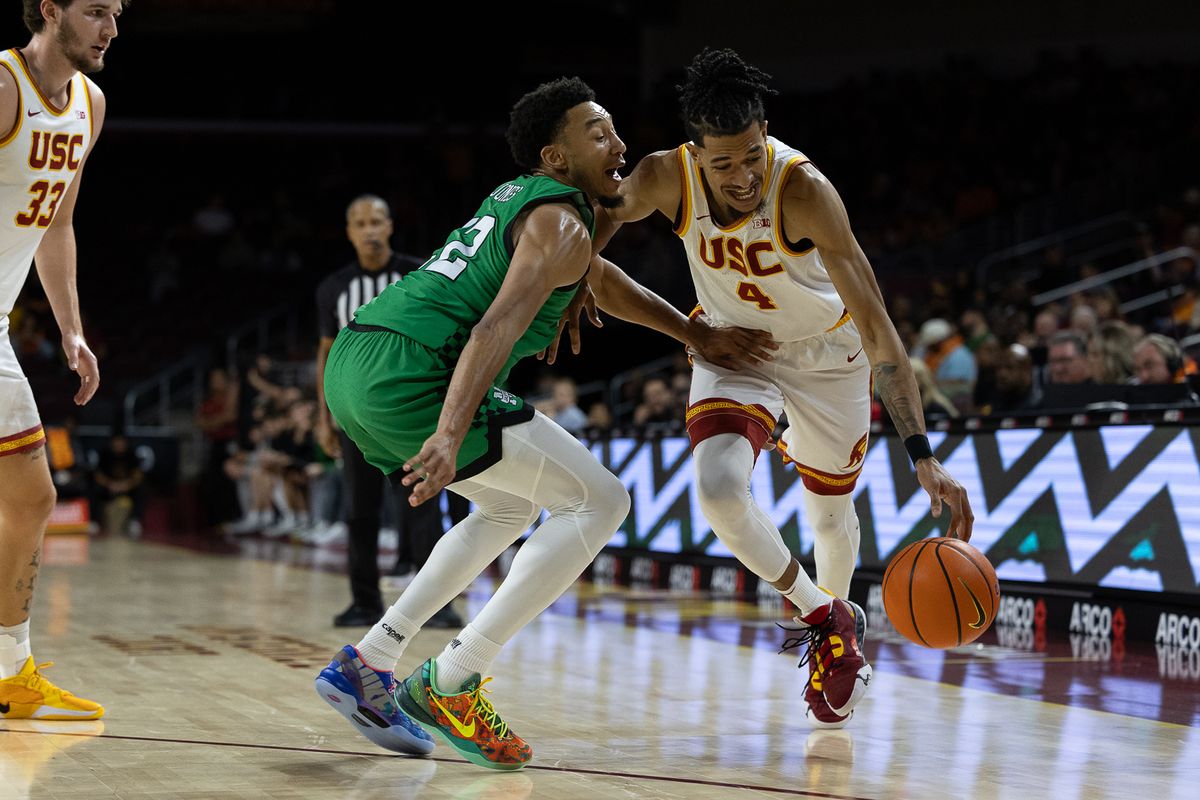 USC Guard Chad Baker-Mazara (4) drives to the basket during a Big Ten basketball game against Manhattan, Sunday November 9, 2025 in Los Angeles, Calif. USC Guard Chad Baker-Mazara (4) drives to the basket during a Big Ten basketball game against Manhattan, Sunday November 9, 2025 in Los Angeles, Calif.
