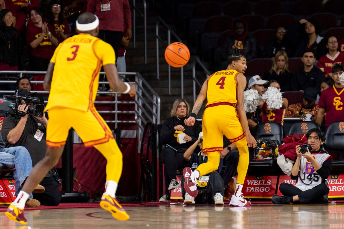 USC Trojans forward Chad Baker-Mazara (4) with a behind the back pass during an NCAA basketball game against the Troy Trojans, Thursday November 20th, 2025 in Los Angeles, California. 