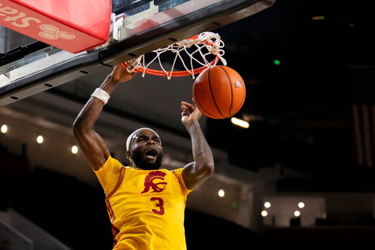 USC Trojans forward Amarion Dickerson (3) finishes the ally-oop dunk during an NCAA basketball game against the Troy Trojans, Thursday November 20th, 2025 in Los Angeles, California. 