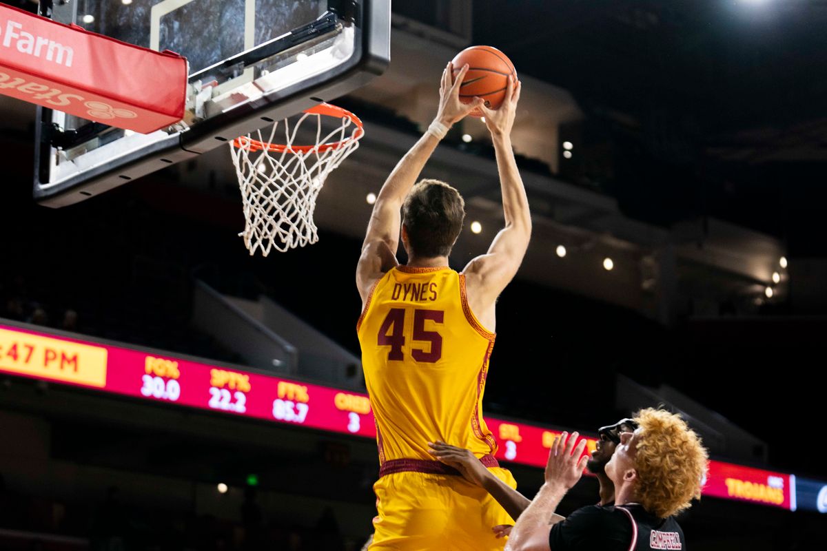 USC Trojans center Gabe Dynes (45) catches a lob and gets fouled during an NCAA basketball game against the Troy Trojans, Thursday November 20th, 2025 in Los Angeles, California. 