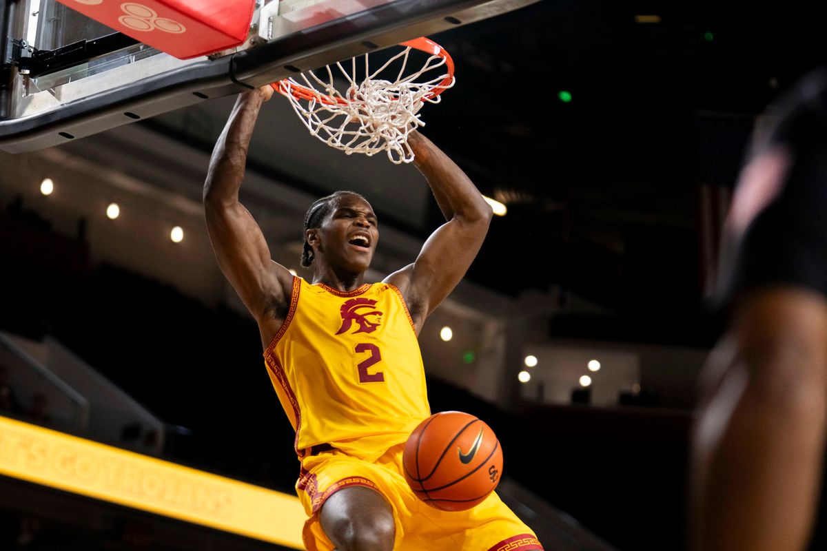 USC Trojans forward Ezra Ausar (2) finishes the ally-oop dunk during an NCAA basketball game against the Troy Trojans, Thursday November 20th, 2025 in Los Angeles, California. 