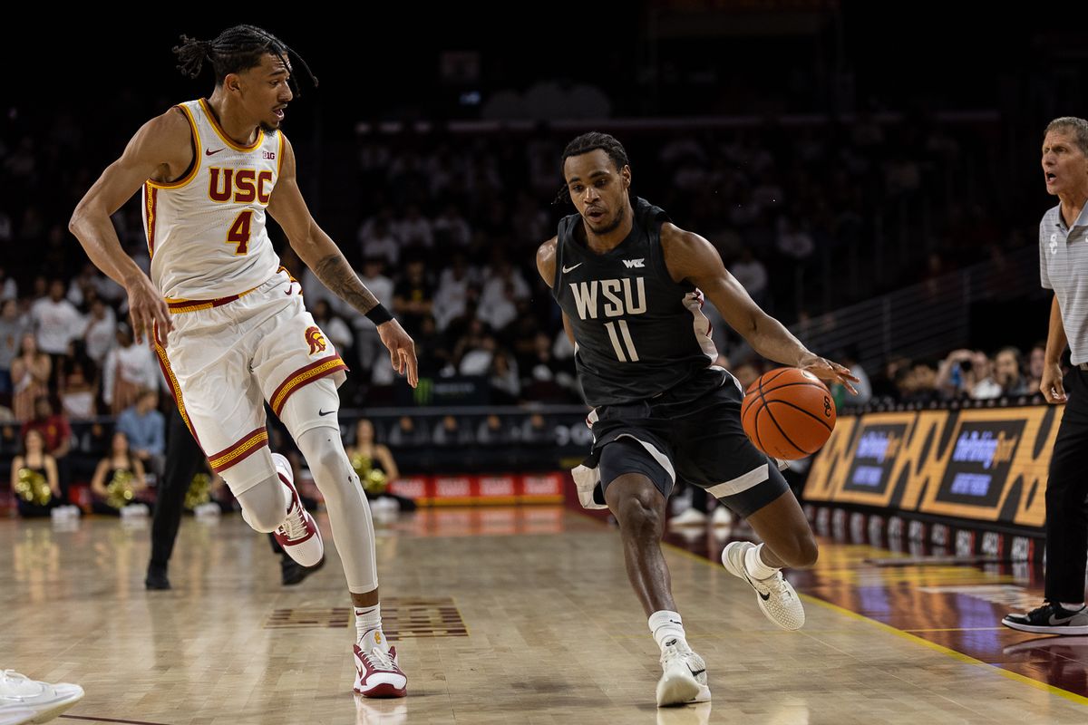 USC guard Chad Baker-Mazara (4) defends during a Big Ten Conference college basketball game against the Washington State Cougars, Sunday December 14, 2025 in Los Angeles, Calif.