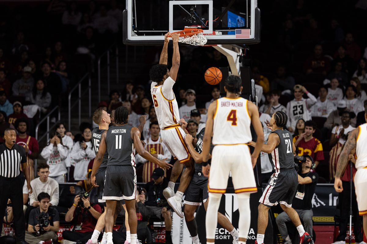 USC forward Jacob Cofie (6) dunks the ball during a Big Ten Conference college basketball game against the Washington State Cougars, Sunday December 14, 2025 in Los Angeles, Calif.