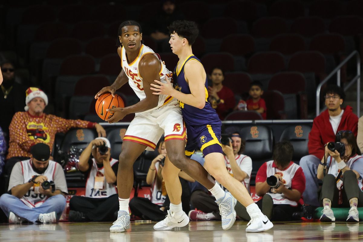 #2 F Ezra Ausar of USC posts up during a NCAA basketball against UC Santa Cruz on December 21, 2025 in Los Angeles, CA.